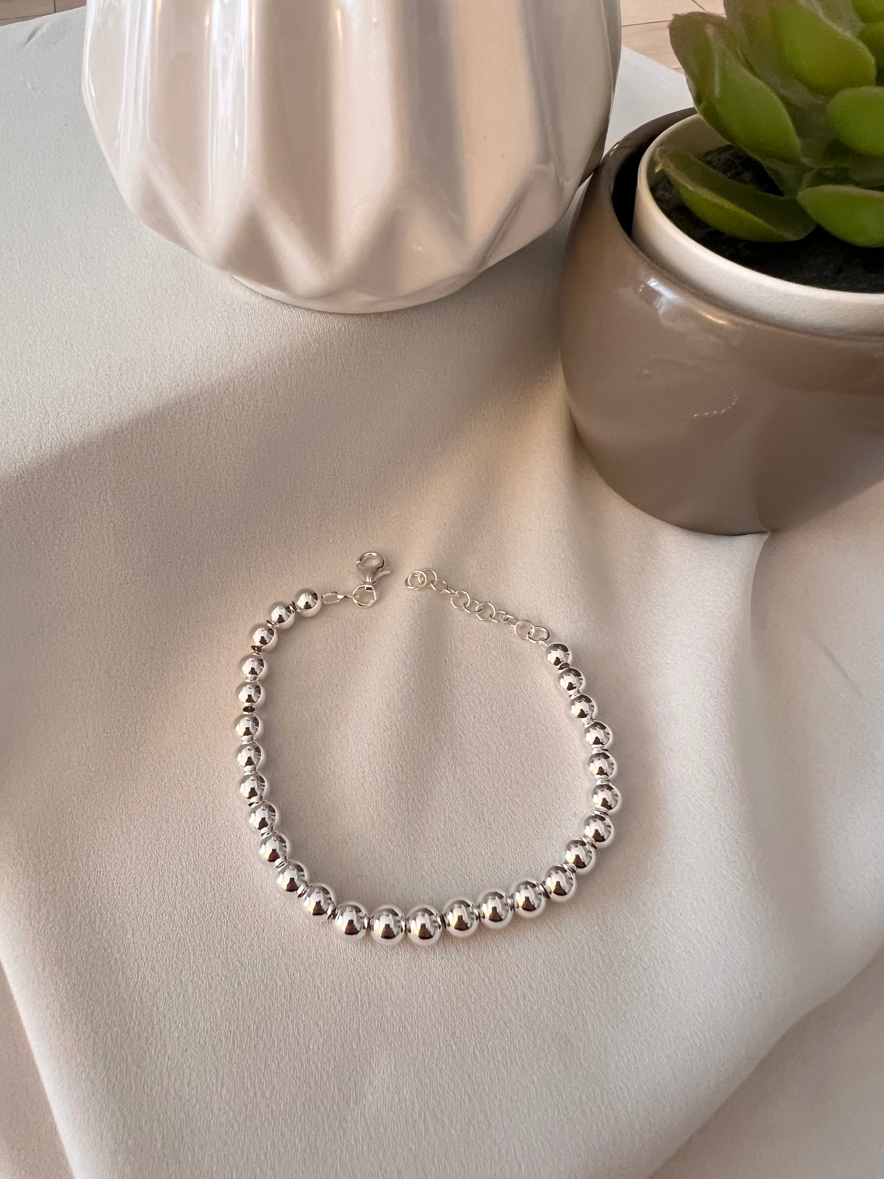 Bracciale palline 0,6 cm Naturale